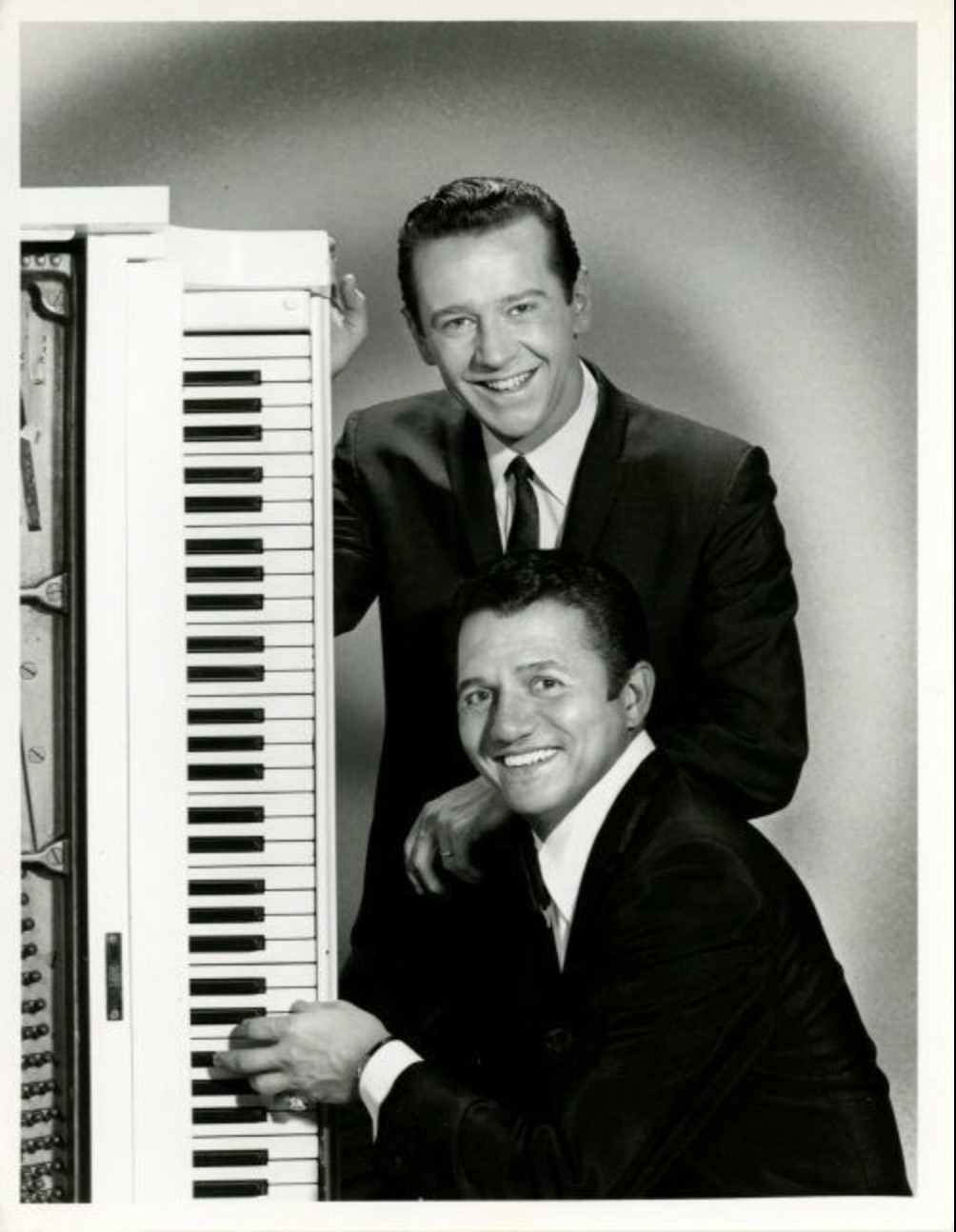 Carlin with singer Buddy Greco. 